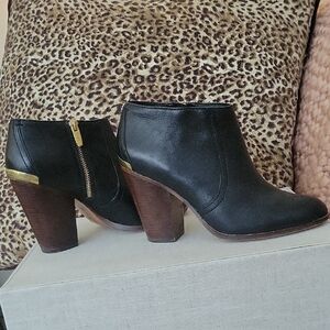 Elegant Black Ankle Boots with Gold Accents